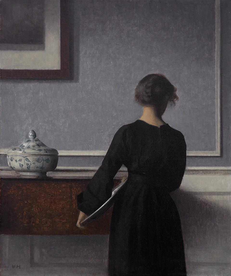 Interior with Young Woman from Behind by Vilhelm Hammershøi (1904), Oil on canvas at Ny Carlsberg Glyptotek