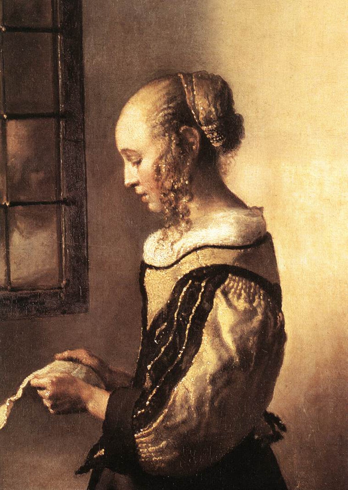 Girl Reading a Letter at an Open Window by Johannes Vermeer