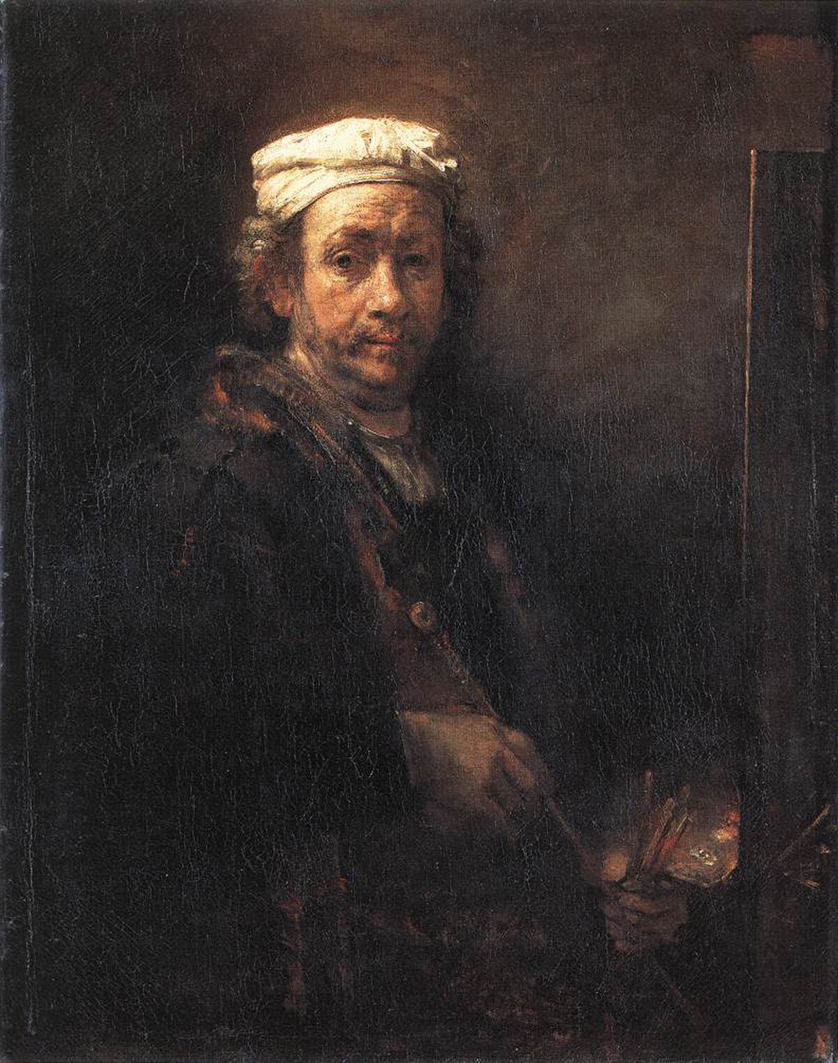 Portrait of the Artist at His Easel, detail of the face by Rembrandt van Rijn