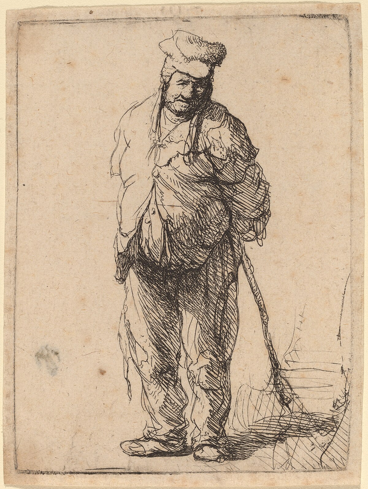 Ragged peasant with his hands behind him, holding a stick by Rembrandt van Rijn