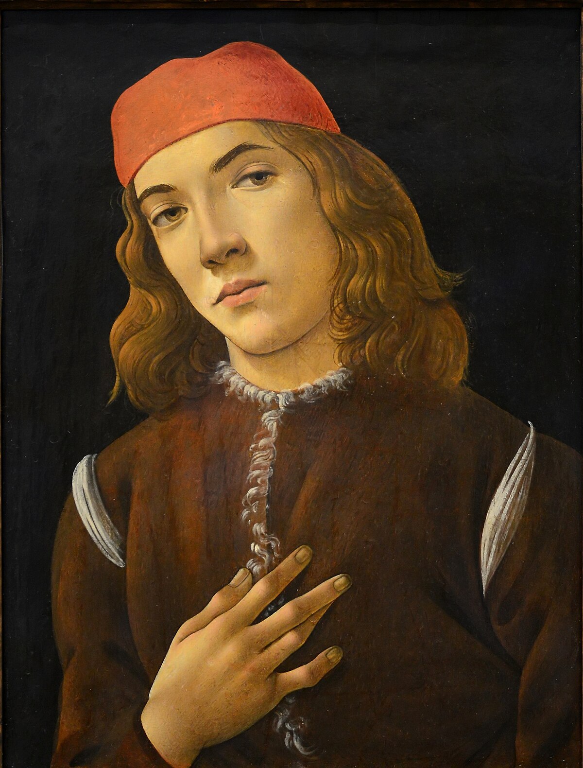 Portrait of a Young Man by Sandro Botticelli at Palazzo Pitti