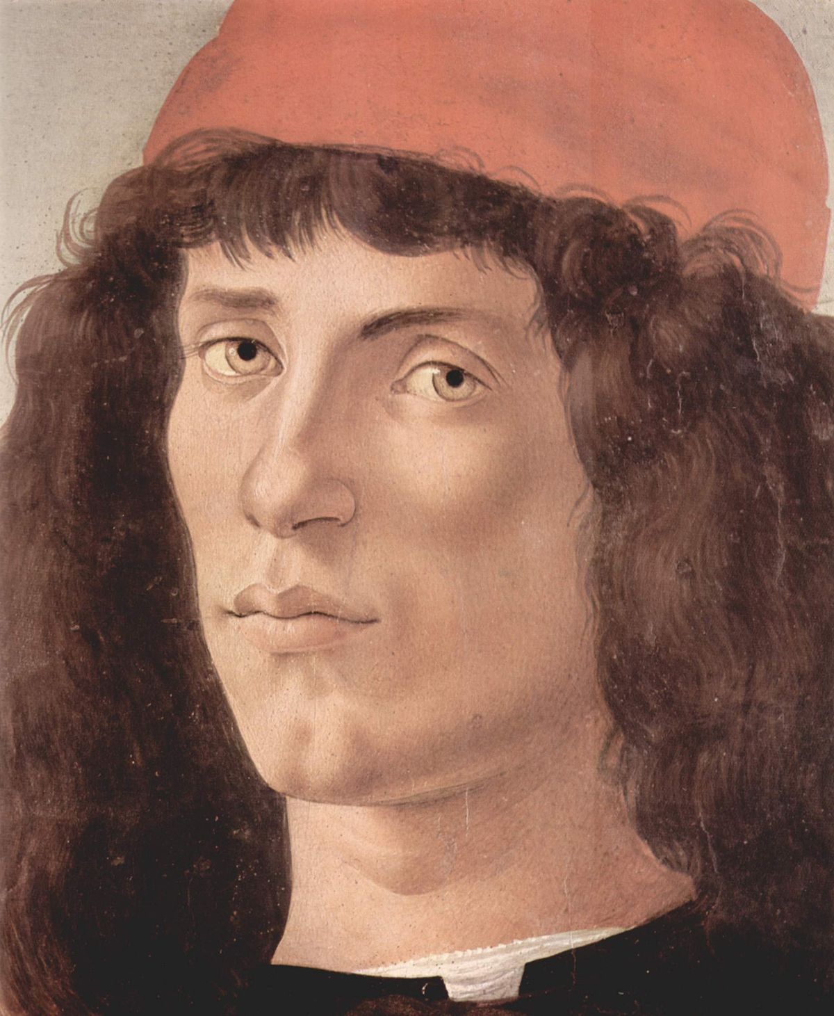 Portrait of a young man with red cap by Sandro Botticelli