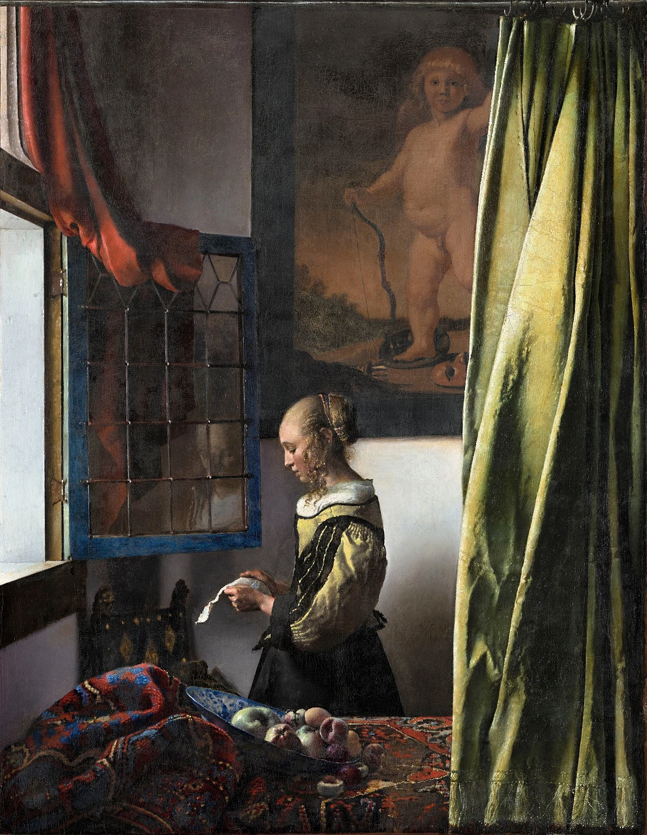 Woman Reading a Letter by Johannes Vermeer